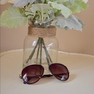 Brown aviators with gold trim